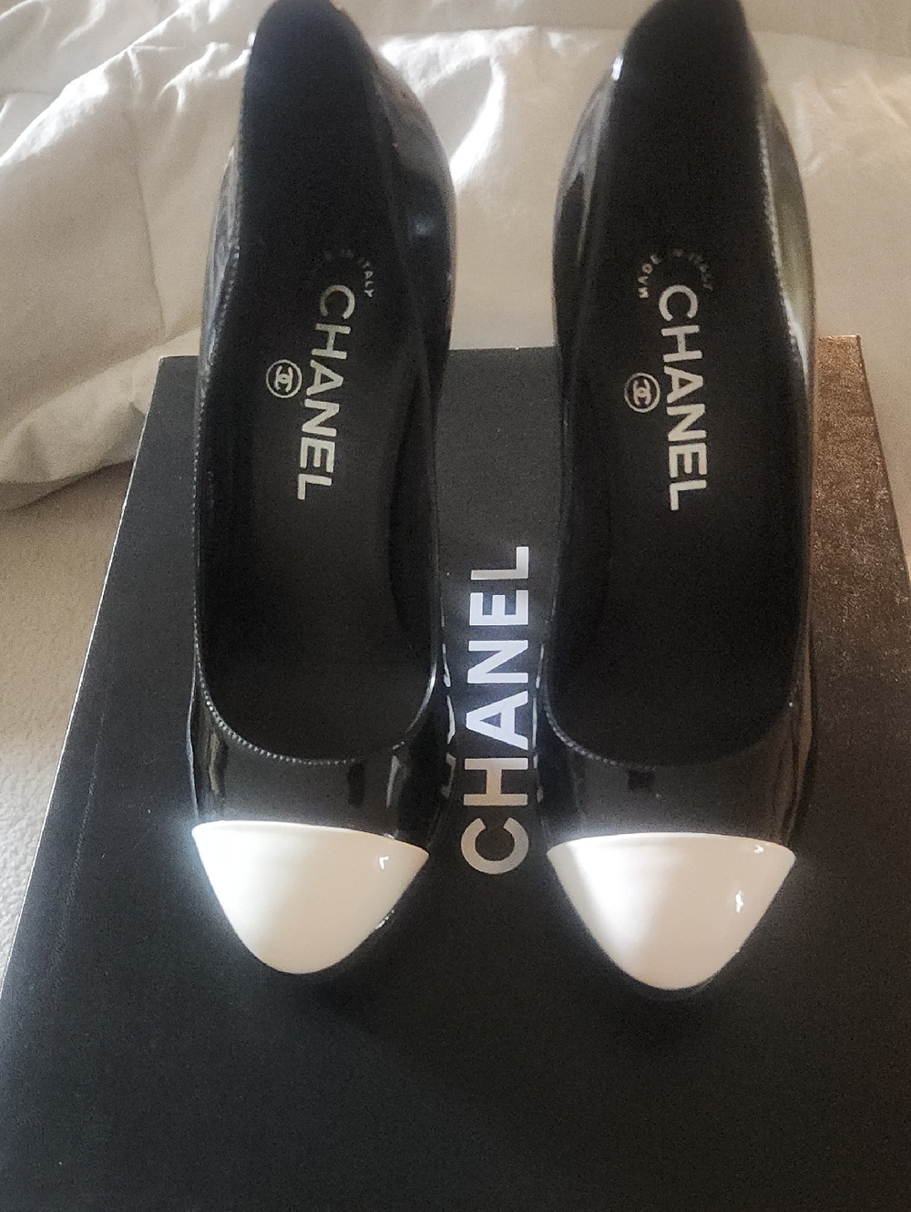 CHANEL Black Patent Leather Pumps with White Cap Toe